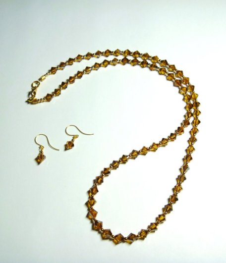 Swarovski Topaz Satin 5328 Xilion Bicone Necklace and Earrings