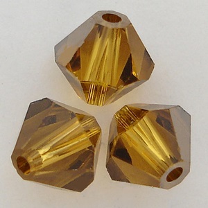 Swarovski Crystal 5328 Xilion Bicone Beads Topaz Satin